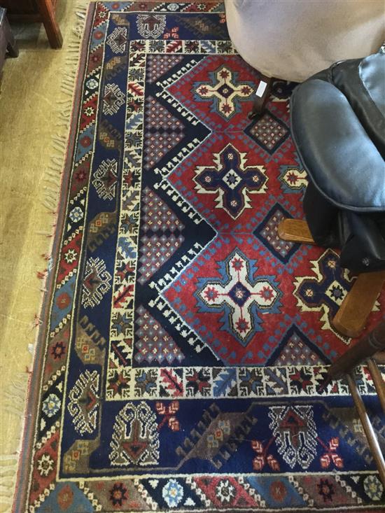 Caucasian red & blue ground rug